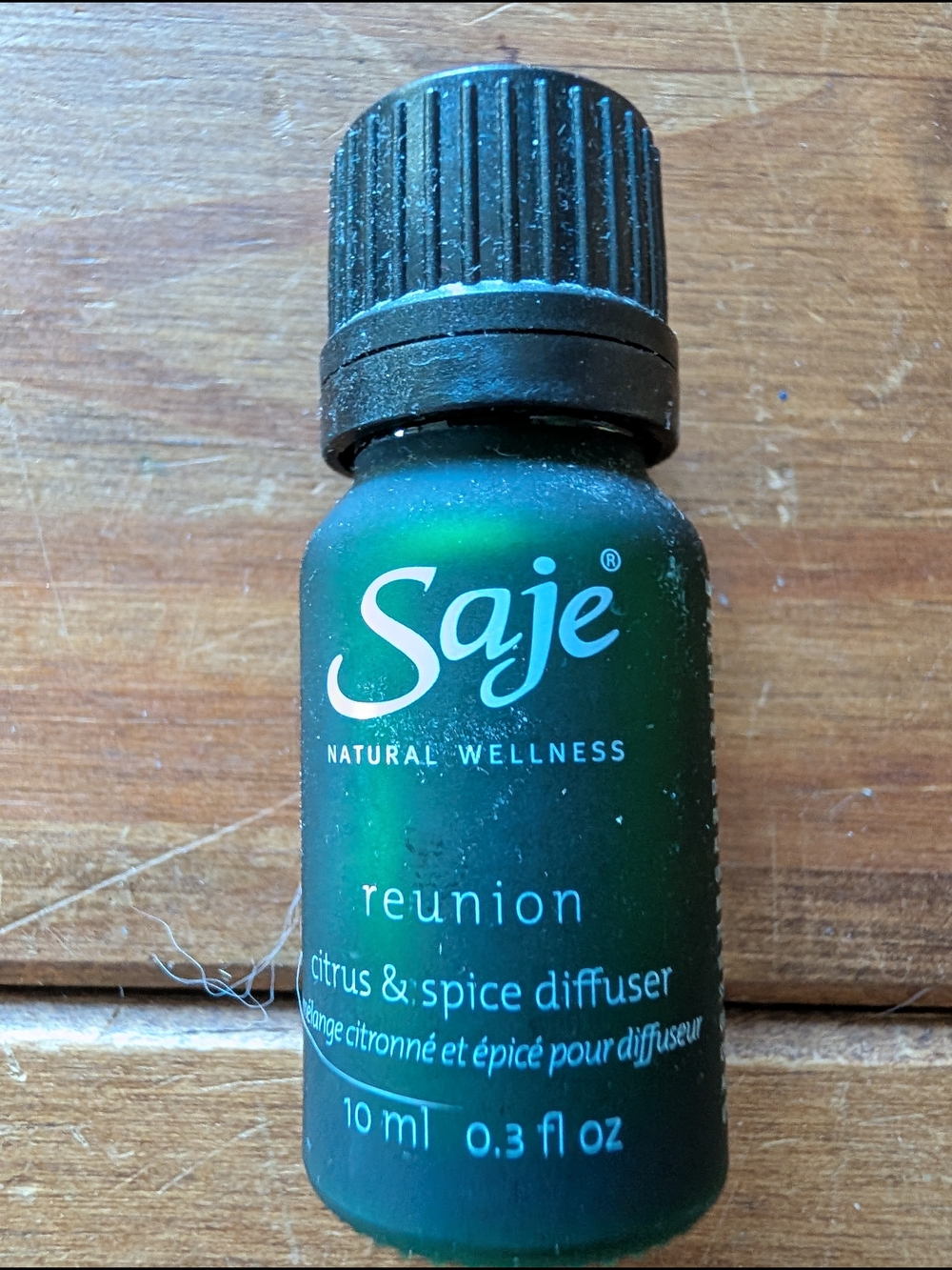Saje Reunion Citrus & Spice Diffuser Oil — Green